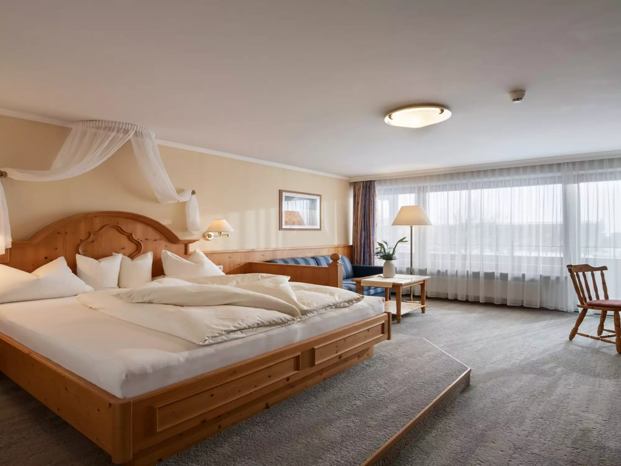 Doppelzimmer im Hotel Andrea mit gemütlicher Einrichtung